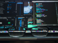 Black Farmed Eyeglasses in Front of Laptop Computer Free Stock Photo
