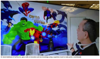 Dr. Karim Budhwani of CerFlux Inc. gave a talk on innovation and new knowledge using a superhero mural to make points. (contributed)
