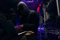 Hacker seated in server room launching cyberattack 2022 01 30 02 11 51 utc