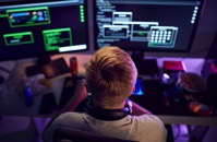 Male teenage hacker sitting in front of computer s 2021 08 27 09 33 58 utc