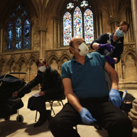 Churches like Lichfield Cathedral near Birmingham, England, have been turned into vaccination hubs. CARL RECINE/REUTERS

