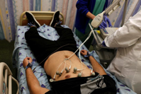 A patient suffering from Long COVID is examined in the post-coronavirus disease (COVID-19) clinic of Ichilov Hospital in Tel Aviv, Israel, February 21, 2022.  Photo: Reuters / AMIR COHEN 