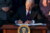 Flickr/White House/Cameron Smith
President Joe Biden signing the Infrastructure Investment and Jobs Act, Monday, November 15, 2021, on the South Lawn of the White House.