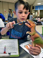 Kid with dinosaur