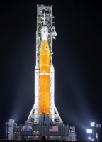 NASA’s Space Launch System (SLS) rocket with the Orion spacecraft aboard is seen illuminated by spotlights atop a mobile launcher at Launch Complex 39B, Friday, March 18, 2022, after being rolled out to the launch pad for the first time at NASA’s Kennedy Space Center in Florida. Ahead of NASA’s Artemis I flight test, the fully stacked and integrated SLS rocket and Orion spacecraft will undergo a wet dress rehearsal at Launch Complex 39B to verify systems and practice countdown procedures for the first launch.
Credits: NASA