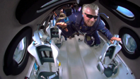 Richard Branson experiences weightlessness on the sub-orbital flight
VIRGIN GALACTIC