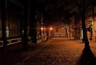 Dark street with cobblestones.