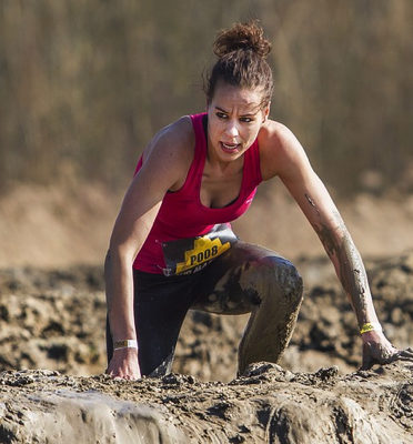 muddy runner