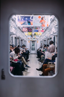 People at the train looking at their phones photo Free Japan Image on Unsplash