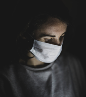 Person in Gray Crew Neck Shirt Wearing White Face Mask Free Stock Photo