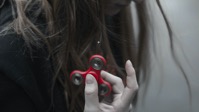 trends - red finger spinner