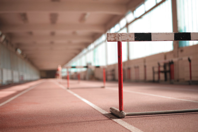 Row of barriers on empty track Free Stock Photo