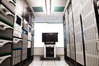 Storage racks aligned in a computer server room 2022 03 04 02 34 53 utc