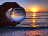 Sunrise through a crystal lensball looking to a br 373WPUV