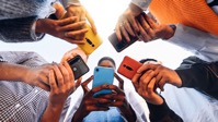 Teens in circle holding smart mobile phones 2022 02 22 15 44 19 utc
