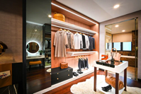 Neat walk in closet and dressing room.