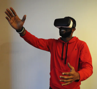 Person using virtual reality headset.