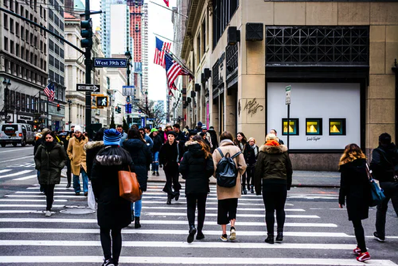 City Street with people walking on a crosswalk