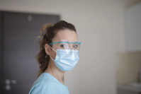 Woman in Blue Shirt Wearing Face Mask Free Stock Photo