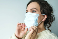 Woman in White Face Mask Free Stock Photo