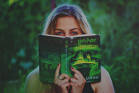 Woman Reading Harry Potter Book Free Stock Photo